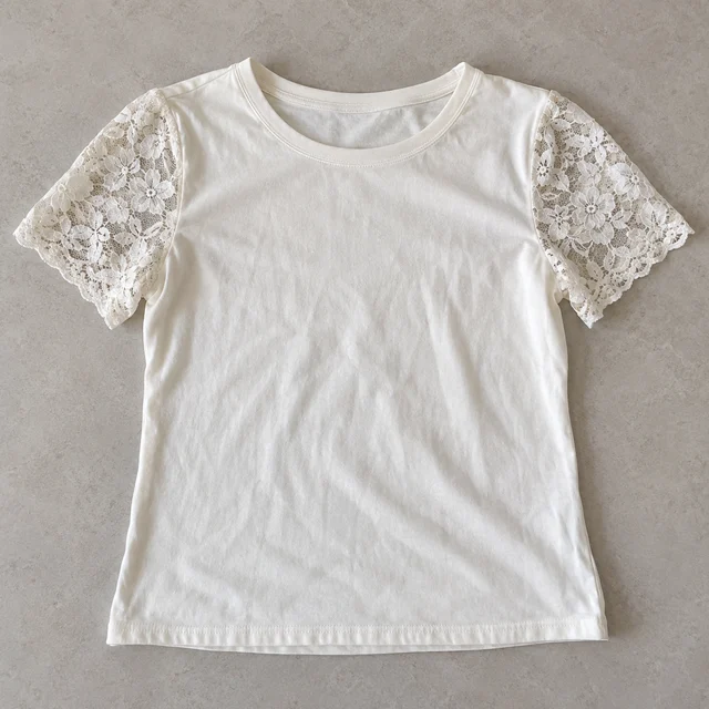 Juliana’s photo of an off-white T-shirt with lace sleeves